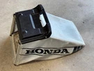 Honda HR215 Hydrostatic Walk Behind Mower Grass Catcher Bag Assembly. Fixed Price $125.00.