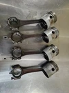 Wisconsin Engine And Set Of 4. DA-51-B DB-208 Pistons. Fixed Price $250.00.