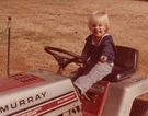 Boy Smiling Riding Murray Lawn Mower Backyard Fun 1981. Fixed Price $6.95.