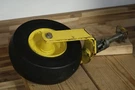John Deere F911 F925 F930 F932 F935 F1145 60 & 72" Mower Deck Caster Wheel. Fixed Price $275.00.