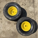 John Deere X300 Rear Tires & Wheels Oem 20X10.00-8NHS. Fixed Price $145.00.