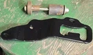 John Deere X300 Deck Lock Arm M153657. Fixed Price $24.95.