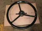 John Deere Steering Wheel Center Cap. Fixed Price $275.00.