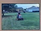 Man Riding Lawn Mower Kodachrome Slide 1970S Suburban Backyard Americana. Fixed Price $6.99.