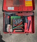 Hilti DX36M Powder Actuated Nail Gun & Case-extras. Fixed Price $185.00.