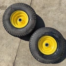 John Deere X300 Oem Front Tires & Wheels 15X6.00-6NHS Carlisle. Fixed Price $85.00.