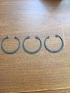 John Deere Original Equipment # N107859 - Snap Ring Lot Of 3. Fixed Price $25.00.