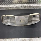 John Deere GX21812: Hood Reflector Headlight. Fixed Price $34.99.