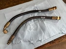 John Deere 335 Power Steering Cylinder Hoses AM118878, AM115453. Fixed Price $17.50.