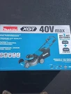 Makita GML01SM 40V Max Xgt 21" Brushless Selfpropelled Lawn Mower W/ Batteries. Fixed Price $695.00.