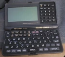 Sharp Wizard OZ-5500 Electronic Organizer Pda Black, Asking For Backup Battery. Fixed Price $21.00.