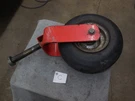 Simplicity 1694454 Snapper ZT18440 Wheel Yoke 5048775CSM W/ Tire 5101418YP. Fixed Price $70.00.