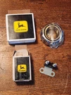 Nos John Deere Parts Bearing Cone JD7209 & Circuit Breaker AR49352. Fixed Price $25.00.