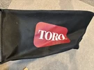 Toro Lawn Mower Grass Catcher Good Condition Never Used (bracket And Bag). Fixed Price $69.99.