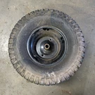Used Rear Wheel And Tire For Ariens 42" Mower 18X9.50-8. Fixed Price $55.00.