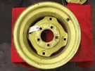 AM104009 John Deere Wheel. Fixed Price $65.00.