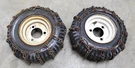 Ariens Set Of Tires With Chains 4.10/3.50-6. Fixed Price $75.00.